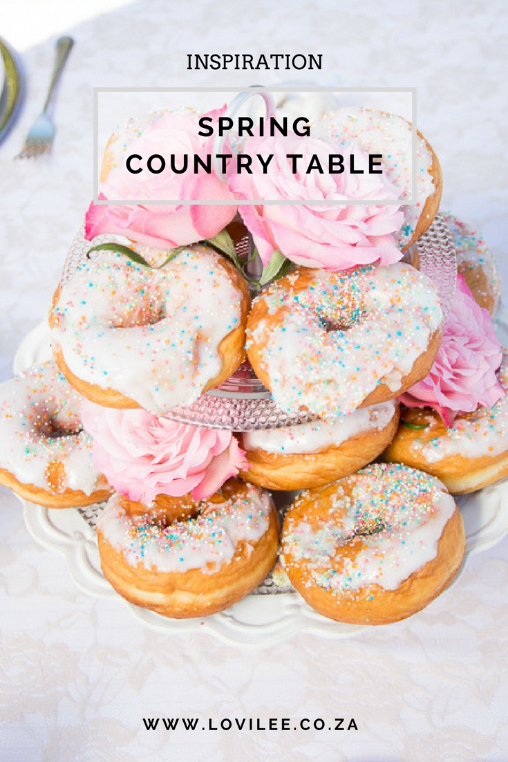 Spring country table complete with a doughnut cake