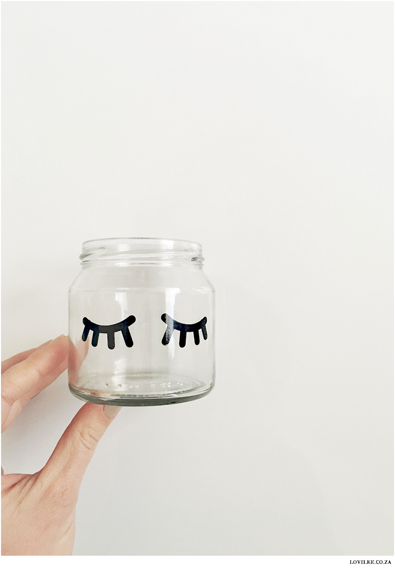 Unicorn vinyl eyes on glass jar