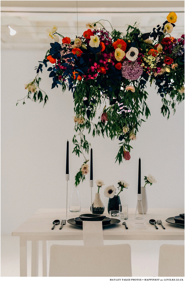 Monochrome colourfburst wedding tablescape