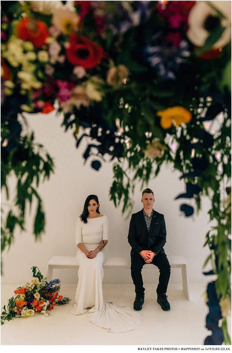 Wedding couple portrait with large colourburst bouquet