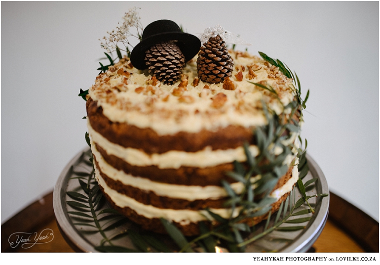 Wedding cake with pine cone toppers