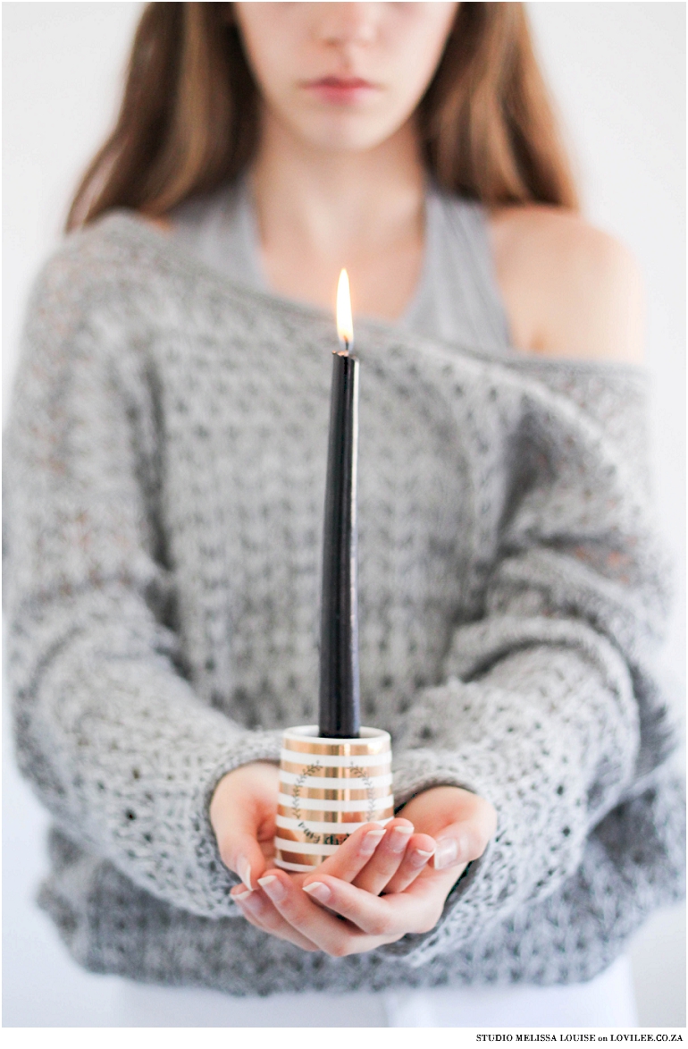 Black candle pose with model