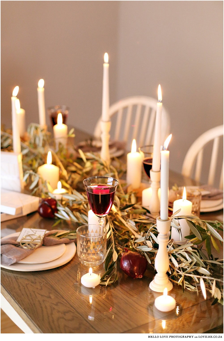 Scandinavian Christmas table decoration with olivebranches