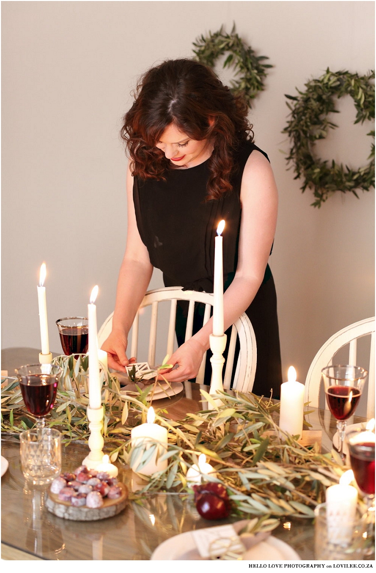 Scandinavian Christmas table decoration with olivebranches