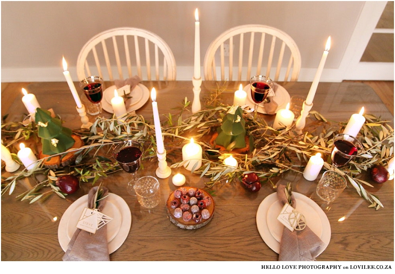 Scandinavian Christmas table decoration with olivebranches