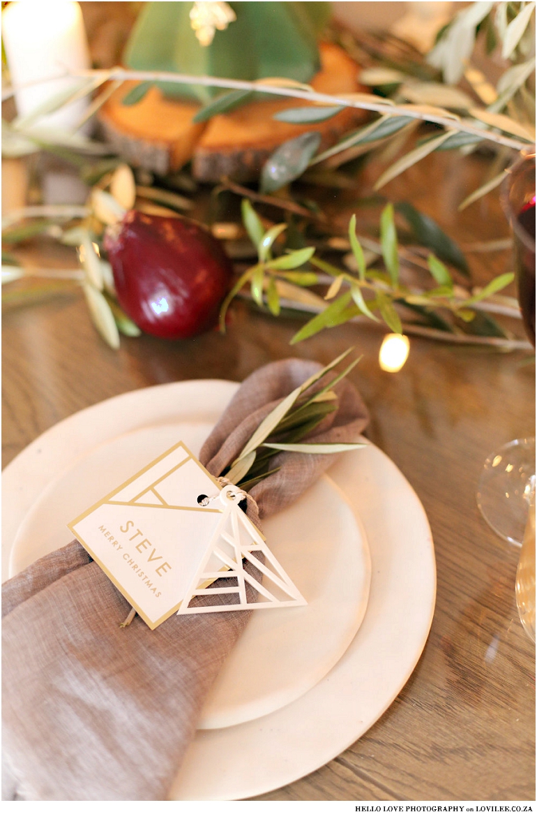 Scandinavian Christmas table decoration with olivebranches