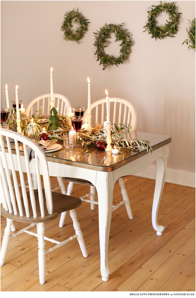 Scandinavian Christmas table decoration with olivebranches