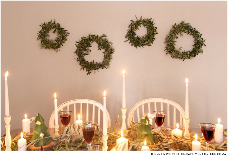 Scandinavian Christmas table decoration with olivebranches