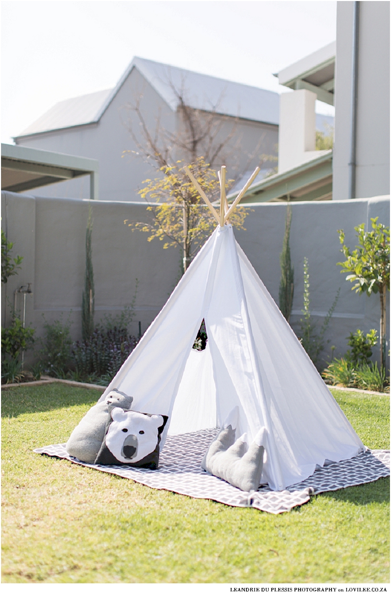 Forest theme kids party teepee in garden