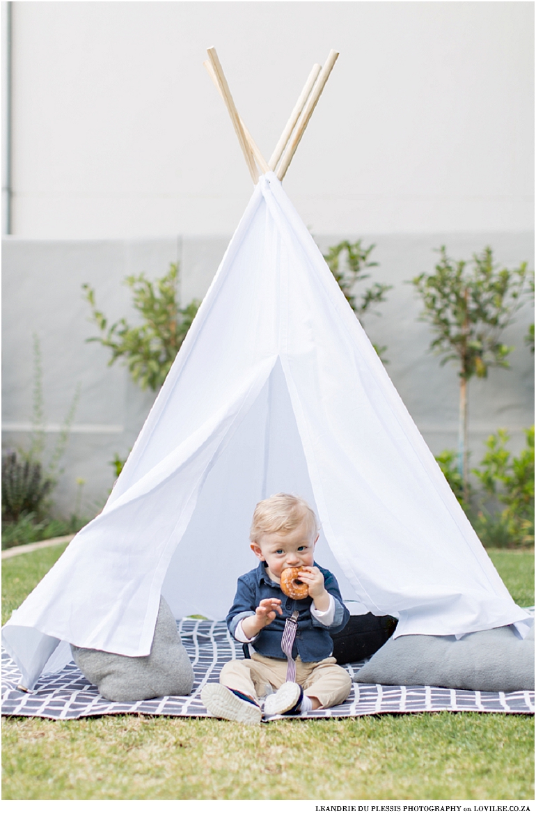 Forest theme kids party teepee in garden