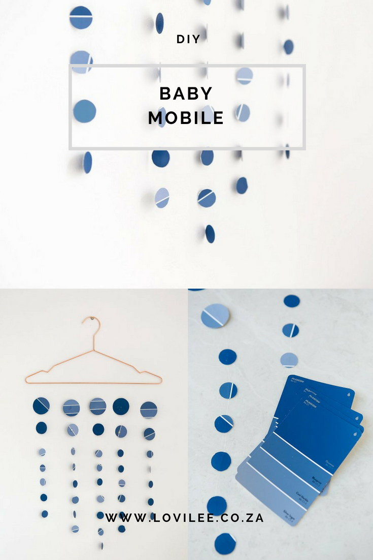 Looking for that perfect accessory for your nursery or a kids room - why not make a baby mobile using paint swatches. Nursery inspiration and ideas