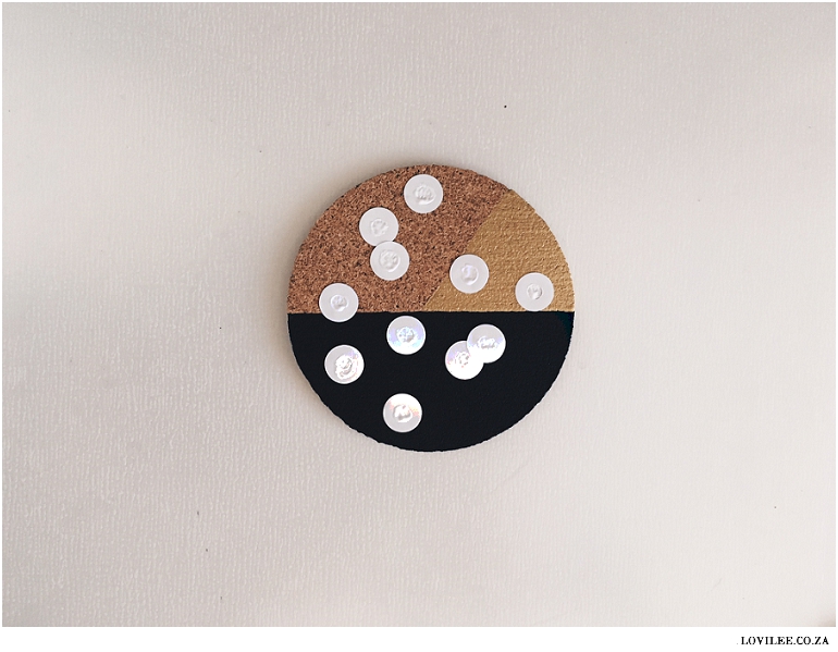 DIY cork coasters using hole reinforcement stickers