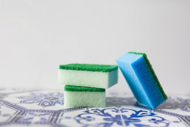 Dishwashing sponges photographed on Moroccan style tiles