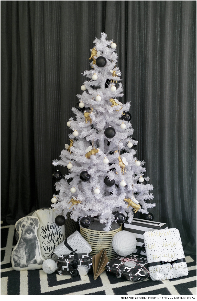 White Artificial Christmas tree with Black and gold decorations