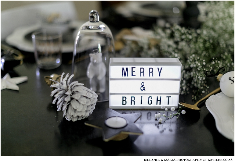 Black and white Christmas table with a mini lightbox