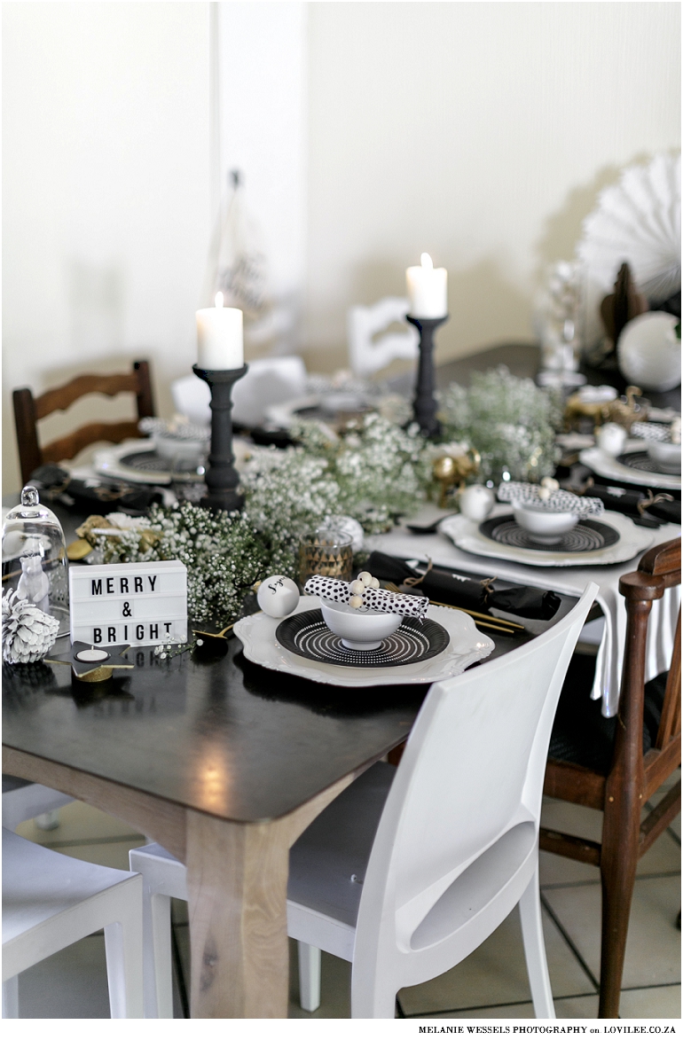 Black and white Christmas table with a mini lightbox