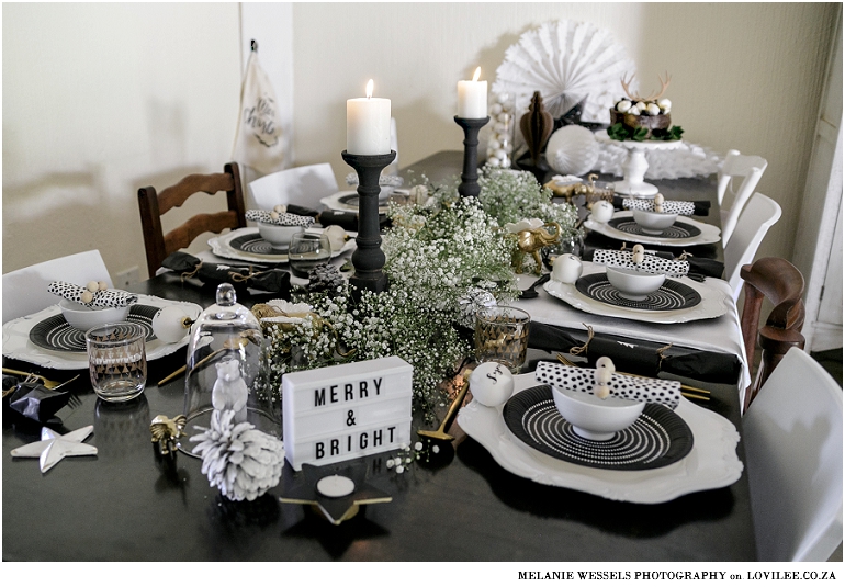 Black and white Christmas table with a mini lightbox