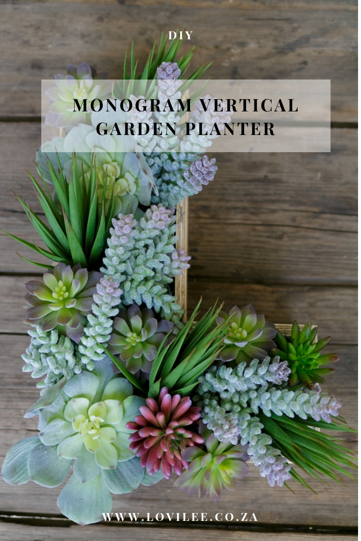 How to make a DIY monogram vertical garden planter with artificial succulents from Distinctive Spaces