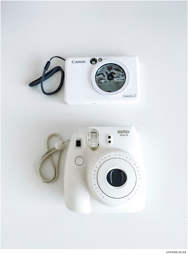 Image of the Canon Zoemini S next to the Instax