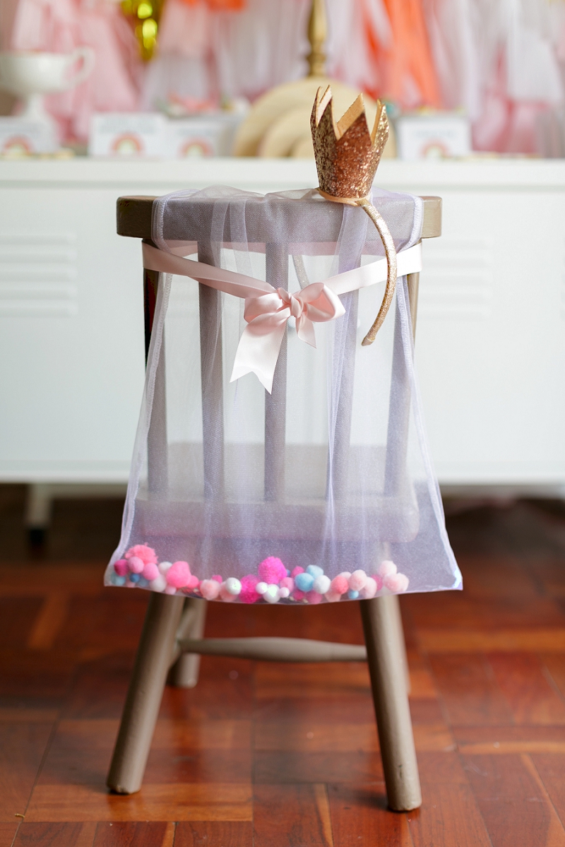 Handmade pom pom capes for rainbow party favors