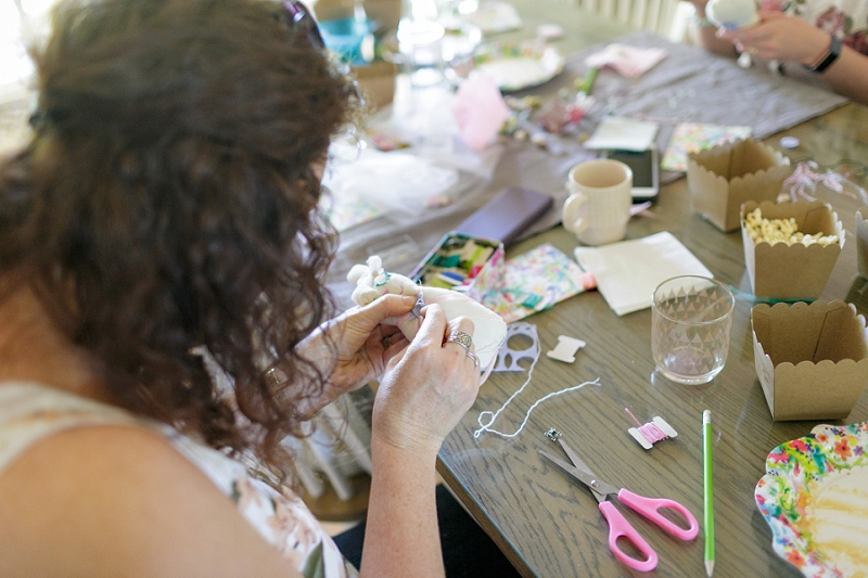 Baby Shower crafting activity embroidering